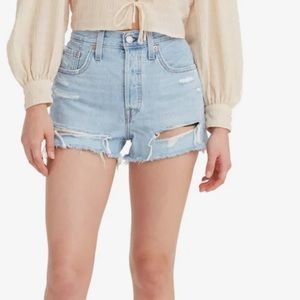 Light wash distressed Levi shorts